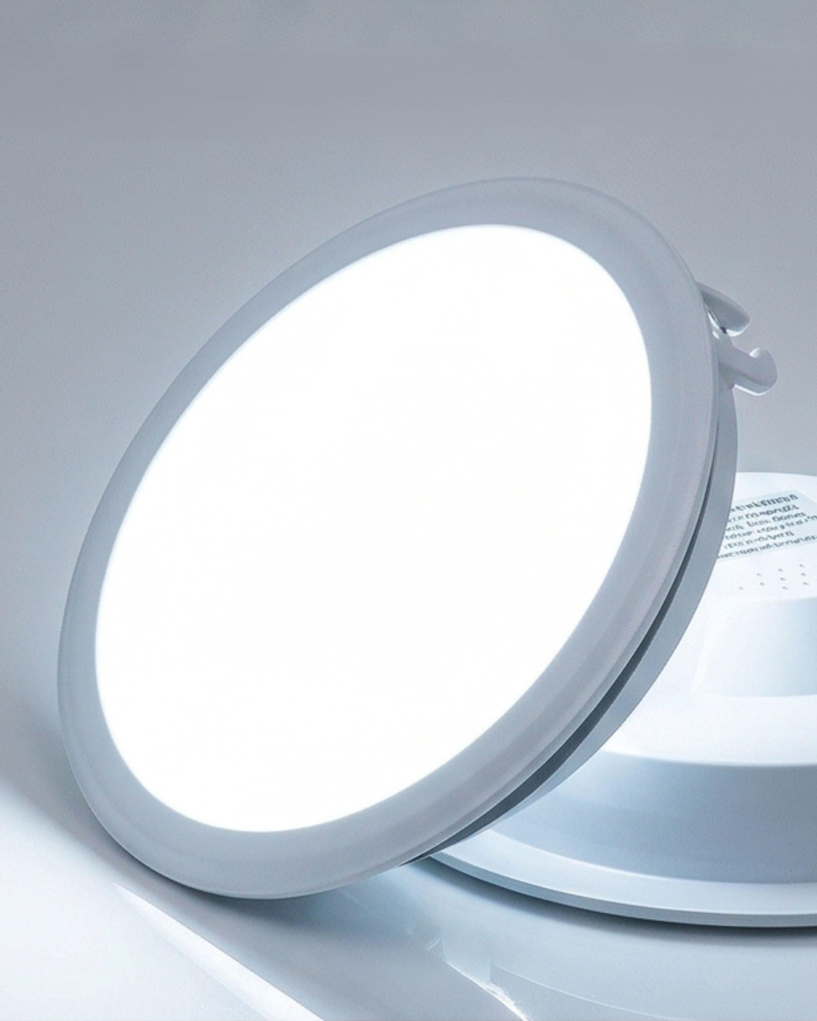 Round LED panel light on a white background