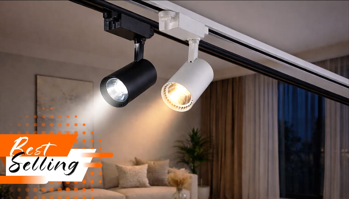 Track lighting system with two lights on a ceiling in a living room setting.
